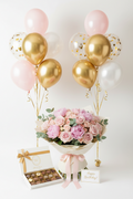 Birthday blooms and balloons and sweetie treats